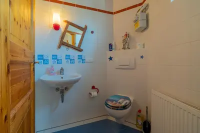 Ein Badezimmer in der Unterkunft Ferienhaus Ginster