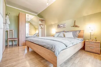 Ein Bett oder Betten in einem Zimmer der Unterkunft Bernstein 02