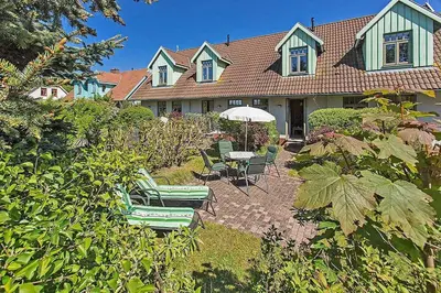 Ein Garten an der Unterkunft Ferienhaussiedlung Strandperlen Küstenhof 2c Typ V