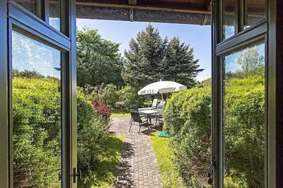 Ein Garten an der Unterkunft Ferienhaussiedlung Strandperlen Küstenhof 2c Typ V