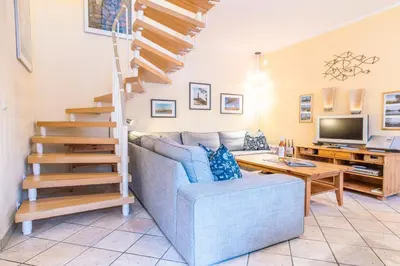 Ein Sitzbereich in der Unterkunft Ferienwohnung Glückspilz