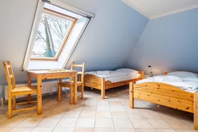 Ein Bett oder Betten in einem Zimmer der Unterkunft Ferienwohnung Glückspilz