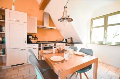 Küche/Küchenzeile in der Unterkunft Ferienwohnung Am Leuchtfeuer OG LF 7 2