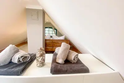 Ein Bett oder Betten in einem Zimmer der Unterkunft Ferienhaus Wolff