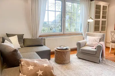 Ein Sitzbereich in der Unterkunft Ferienhaus Wolff