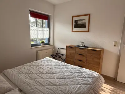 Ein Bett oder Betten in einem Zimmer der Unterkunft Ferienwohnung Seeigel