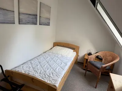 Ein Bett oder Betten in einem Zimmer der Unterkunft Ferienwohnung Seeigel
