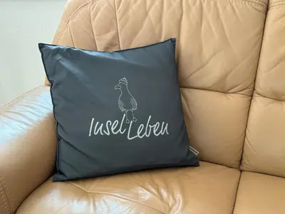 Ein Sitzbereich in der Unterkunft Ferienwohnung Seeigel