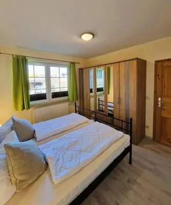 Ein Bett oder Betten in einem Zimmer der Unterkunft Schulstr. 19 