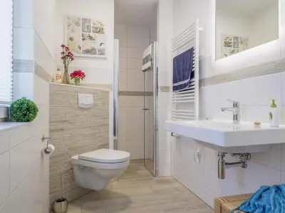 Ein Badezimmer in der Unterkunft Rosenbergsiedlung 13 A 