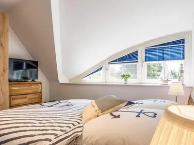 Ein Bett oder Betten in einem Zimmer der Unterkunft Rosenbergsiedlung 13 A 