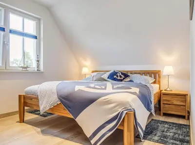 Ein Bett oder Betten in einem Zimmer der Unterkunft Rosenbergsiedlung 13 A 