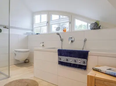 Ein Badezimmer in der Unterkunft Rosenbergsiedlung 13 A 