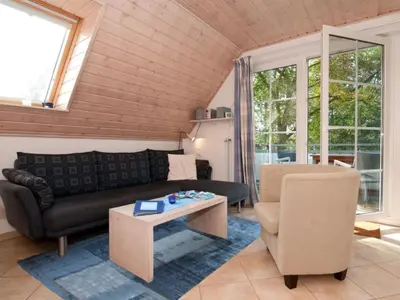 Ein Sitzbereich in der Unterkunft Strandmuschel