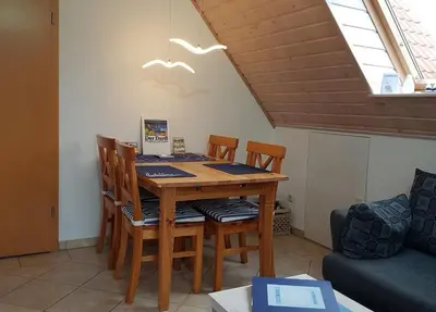Ein Sitzbereich in der Unterkunft Strandmuschel