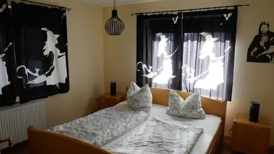 Ein Bett oder Betten in einem Zimmer der Unterkunft Hexenhaus Mittelerde