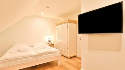 Ein Bett oder Betten in einem Zimmer der Unterkunft Traumgarten Haus Kleine Auszeit