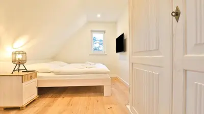 Ein Bett oder Betten in einem Zimmer der Unterkunft Traumgarten Haus Kleine Auszeit