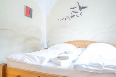 Ein Bett oder Betten in einem Zimmer der Unterkunft Hexenhaus Remise