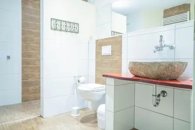 Ein Badezimmer in der Unterkunft Hexenhaus Remise