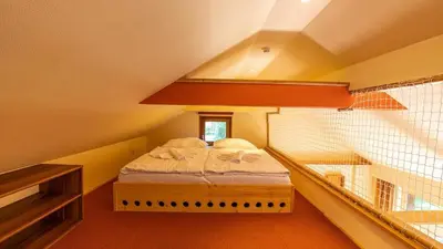 Ein Bett oder Betten in einem Zimmer der Unterkunft Hexenhaus kleine Finka