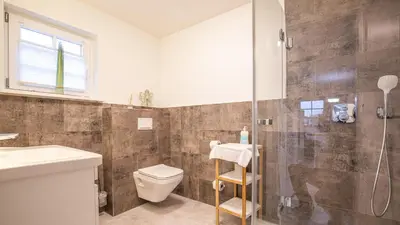 Ein Badezimmer in der Unterkunft Kapitänshaus Koje