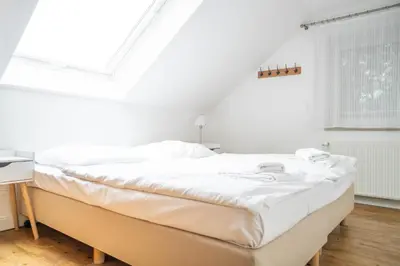 Ein Bett oder Betten in einem Zimmer der Unterkunft Haus Alte Bäckerei Deichgraf
