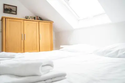 Ein Bett oder Betten in einem Zimmer der Unterkunft Haus Alte Bäckerei Deichgraf