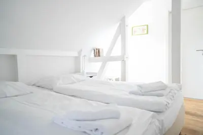 Ein Bett oder Betten in einem Zimmer der Unterkunft Haus Alte Bäckerei Deichgraf
