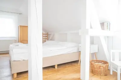 Ein Bett oder Betten in einem Zimmer der Unterkunft Haus Alte Bäckerei Deichgraf