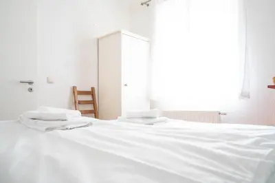 Ein Bett oder Betten in einem Zimmer der Unterkunft Haus Alte Bäckerei Sandbank