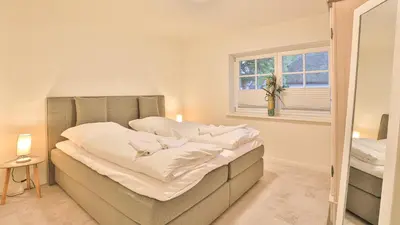 Ein Bett oder Betten in einem Zimmer der Unterkunft Kapitänshaus Kajüte