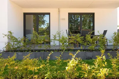 Ein Garten an der Unterkunft Apartmenthaus Wittsande Wittsande 06