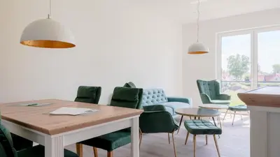 Ein Sitzbereich in der Unterkunft Apartmenthaus Wittsande Wittsande 07