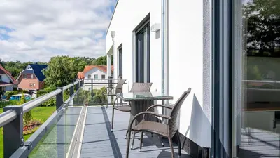 Ein Balkon oder eine Terrasse in der Unterkunft Apartmenthaus Wittsande Wittsande 08