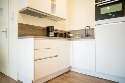 Küche/Küchenzeile in der Unterkunft Apartmenthaus Wittsande Wittsande 09
