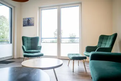 Ein Sitzbereich in der Unterkunft Apartmenthaus Wittsande Wittsande 09