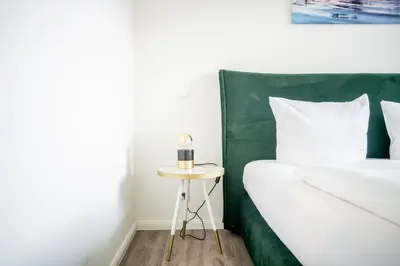 Ein Bett oder Betten in einem Zimmer der Unterkunft Apartmenthaus Wittsande Wittsande 09