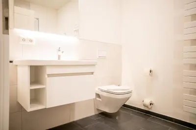 Ein Badezimmer in der Unterkunft Apartmenthaus Wittsande Wittsande 09
