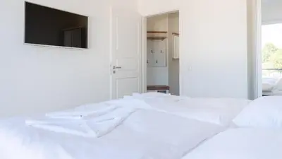 Ein Bett oder Betten in einem Zimmer der Unterkunft Apartmenthaus Wittsande Wittsande 10