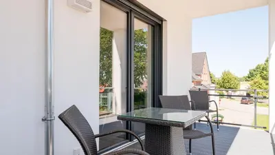 Ein Balkon oder eine Terrasse in der Unterkunft Apartmenthaus Wittsande Wittsande 10