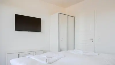 Ein Bett oder Betten in einem Zimmer der Unterkunft Apartmenthaus Wittsande Wittsande 11