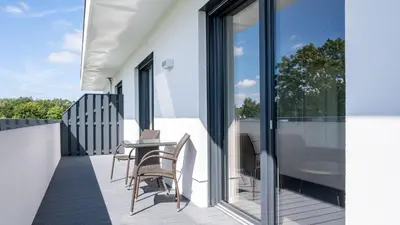 Ein Balkon oder eine Terrasse in der Unterkunft Apartmenthaus Wittsande Wittsande 13