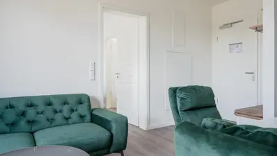 Ein Sitzbereich in der Unterkunft Apartmenthaus Wittsande Wittsande 13
