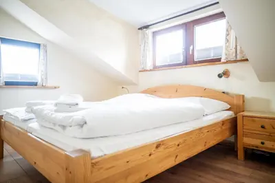 Ein Bett oder Betten in einem Zimmer der Unterkunft Hexenhaus Kammer