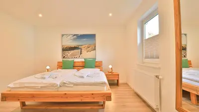 Ein Bett oder Betten in einem Zimmer der Unterkunft Mühlenhaus Siebkammer