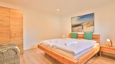 Ein Bett oder Betten in einem Zimmer der Unterkunft Mühlenhaus Siebkammer