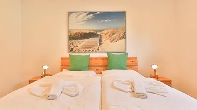 Ein Bett oder Betten in einem Zimmer der Unterkunft Mühlenhaus Siebkammer