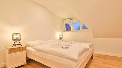 Ein Bett oder Betten in einem Zimmer der Unterkunft Traumgarten Haus Traumoase