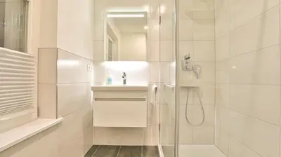 Ein Badezimmer in der Unterkunft Traumgarten Haus Unschuld
